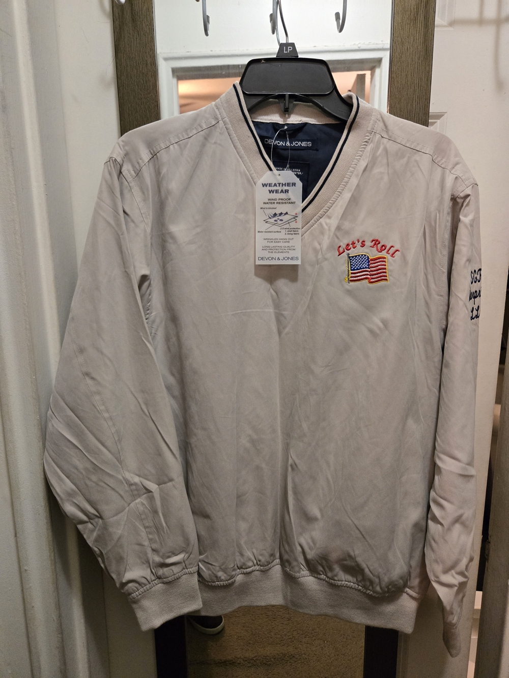 Devon & Jones Beige 'Let's Roll' Pullover with Flag Patch